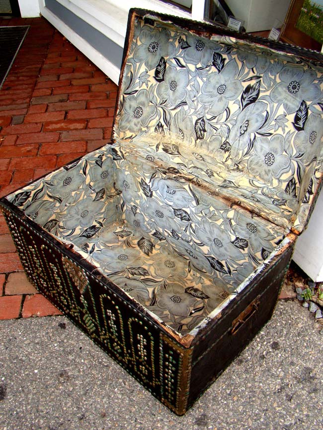 A late 18th or early 19th century brass decorated leather trunk with canted top — image 4